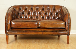 STUNNING FULLY RESTORED HAND DYED WHISKEY BROWN LEATHER TWO SEATER SOFA (1/2)