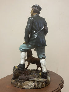 COLLECTORS COUNTRY MAN WITH DOG FIGURINE