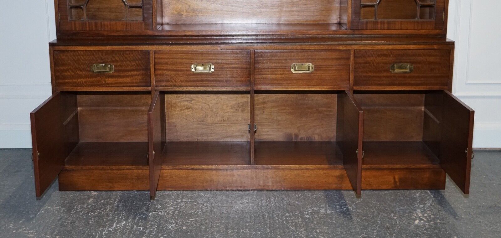 VINTAGE BEVAN FUNNELL MILITARY CAMPAIGN BOOKCASE WITH EMBOSSED LEATHER DOORS