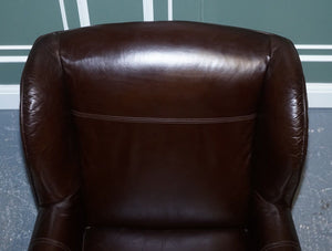 VINTAGE PAIR OF CHOCOLATE BROWN LEATHER WINGBACK CHAIRS