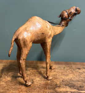 LiBERTY'S LONDON CAMEL SCULPTURE WITH LOVELY AGED LEATHER ON HAND CARVED WOOD