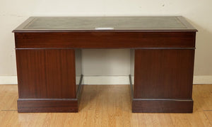 LARGE MAHOGANY TWIN PEDESTAL OFFICE DESK WITH GREEN INLAID LEATHER TOP.