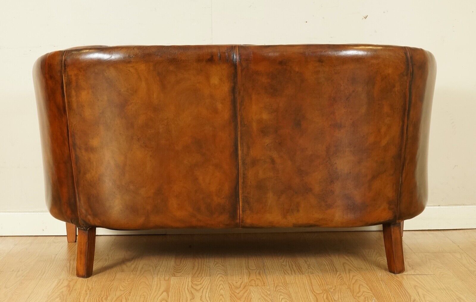 STUNNING FULLY RESTORED HAND DYED WHISKEY BROWN LEATHER TWO SEATER SOFA (1/2)