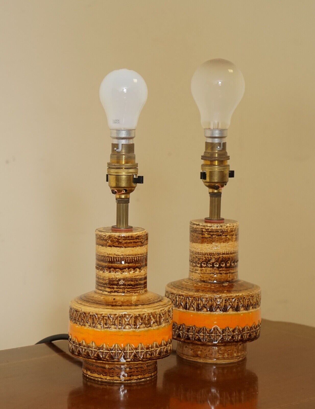 PAIR 1960'S ITALIAN ORANGE AND BROWN CERAMIC LAMPS BY ALDO LONDI FOR BITOSSI