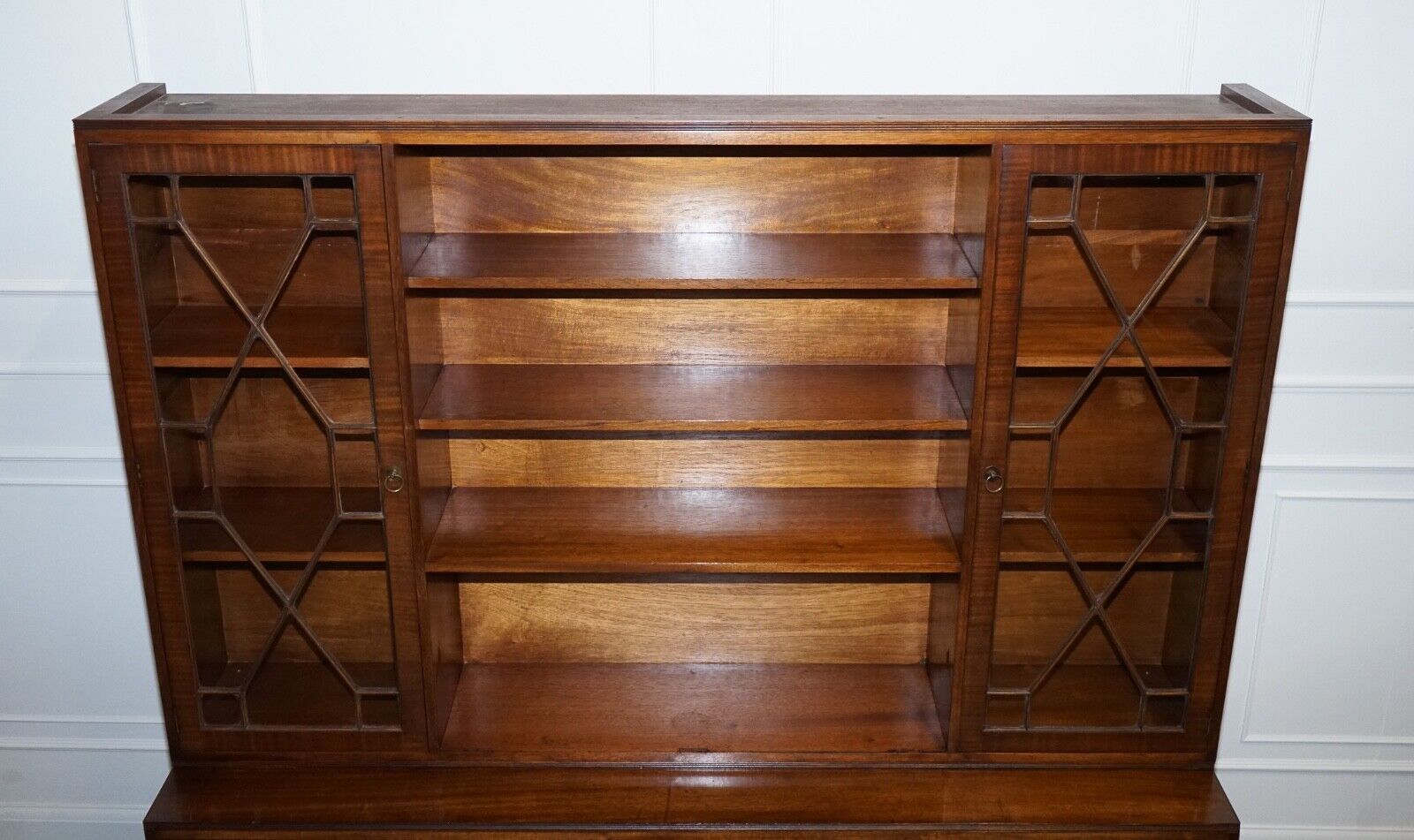 VINTAGE BEVAN FUNNELL MILITARY CAMPAIGN BOOKCASE WITH EMBOSSED LEATHER DOORS